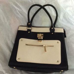 Black and White Satchel lock handbag. Beautiful.